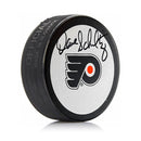Dave 'The Hammer' Schultz Philadelphia Flyers Autographed White Hockey Logo Puck by Dynasty Sports & Framing