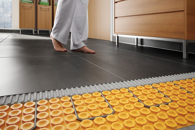 Electric radiant floor heating cables used with DITRA-HEAT membrane