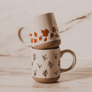 Orange Leaves 14 oz Cream Stoneware Coffee Mug by Sweet Water Decor