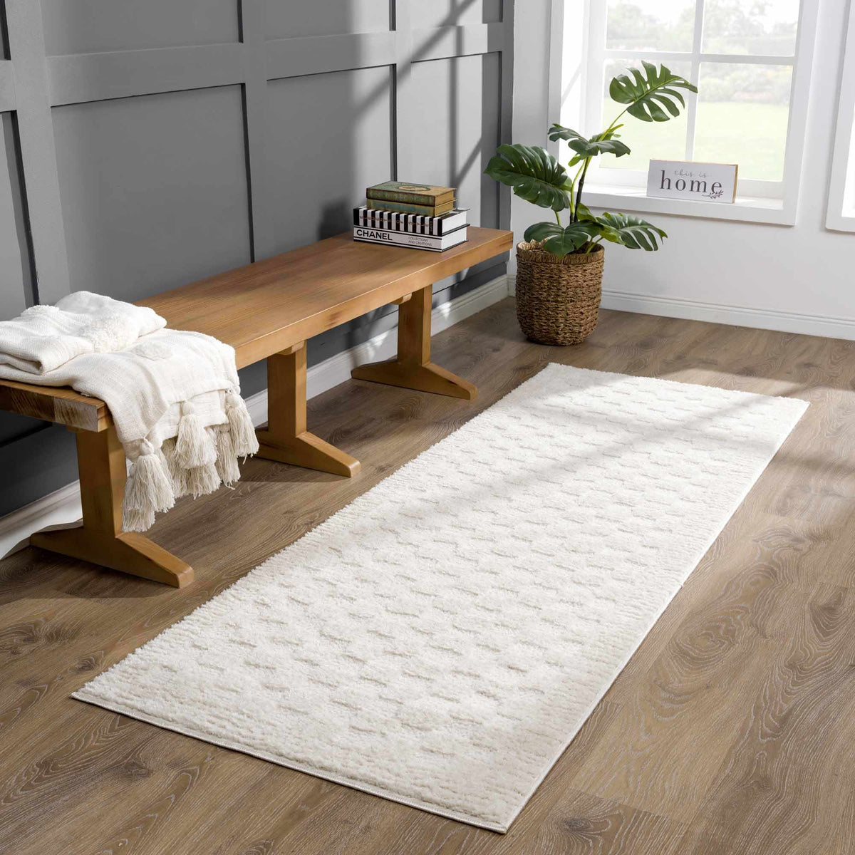 Leryn Ivory Checkered Area Rug, installed in a room