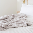 PATTERNED FAUX FUR XL THROW BLANKETS by Saranoni