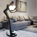 Figure Holding Ball Sculpture Floor Lamp