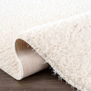 Faina Solid Cream Shag Washable Area Rug - Clearance