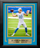 Justin Herbert in Action Los Angeles Chargers 8" x 10" Framed Football Photo by Dynasty Sports & Framing