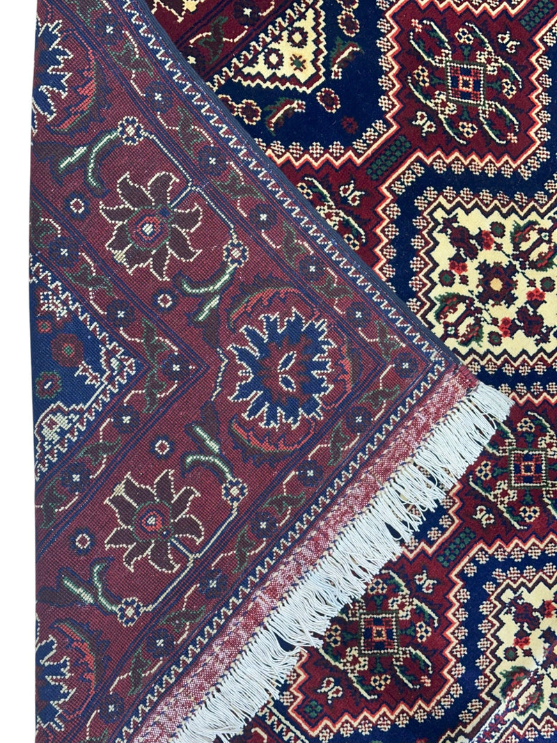 Hand-Knotted Afghani Yusufbai Wool Rug – 6’10″  x  9’10″