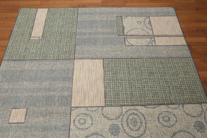 5'4"x7'8" Blue, Beige, Green, Multi Color Machine Made Polypropylene Indonesian High Density Hand Carved Effect Modern Oriental Rug With one edge damaged