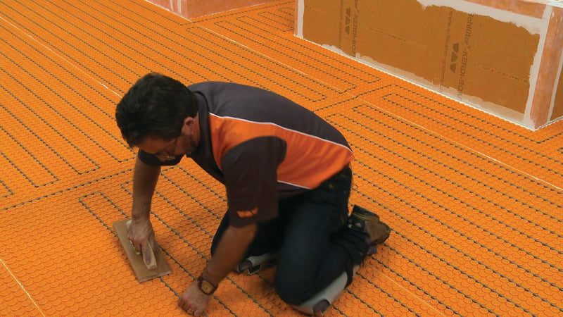 Electric radiant floor heating cables used with DITRA-HEAT membrane