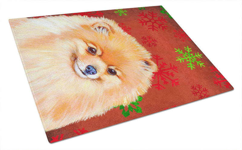 Pomeranian Red and Green Snowflakes Holiday Christmas Glass Cutting Board Large