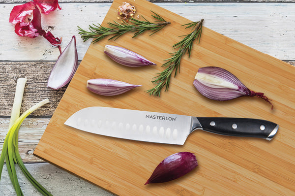 MASTERPAN Santoku Knife With Stainless Steel blade & Cover, 7" (18cm), installed in a room