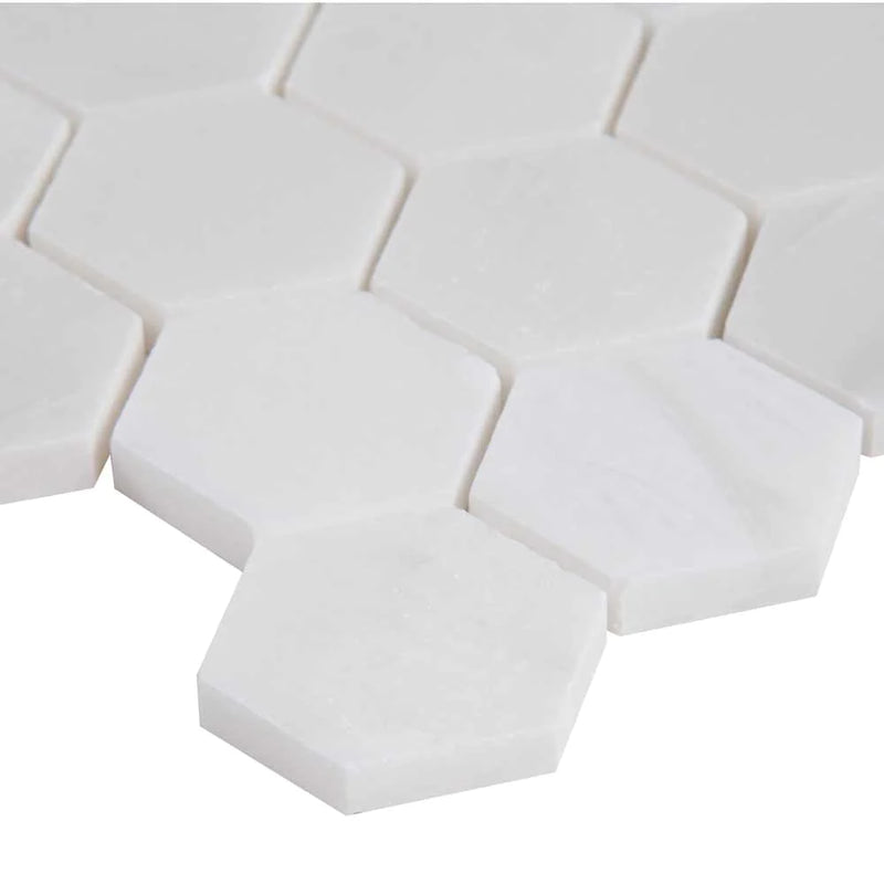 MSI Greecian white 2 inch hexagon 11.75X12 polished marble mosaic tile SMOT GRE 2HEXP edge view.