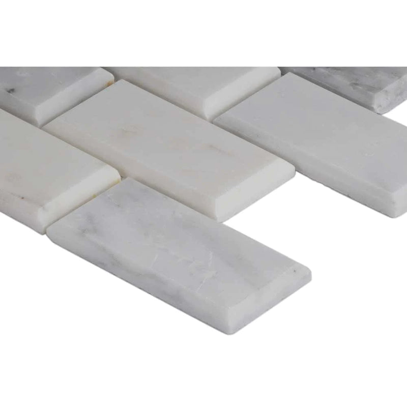 MSI Greecian white 2x4 beveled 12X12 polished marble mosaic tile SMOT GRE 2X4PB edge view.