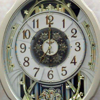 Moving Face Pendulum Wall Clock - Plays Melodies Every Hour, photo 3 of 4