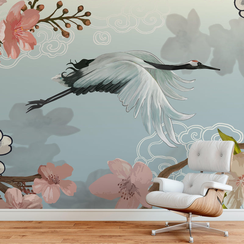 Manchurian Crane Flying Over Cherry Blossoms Peel and Stick Wallpaper | Removable Wall Mural.