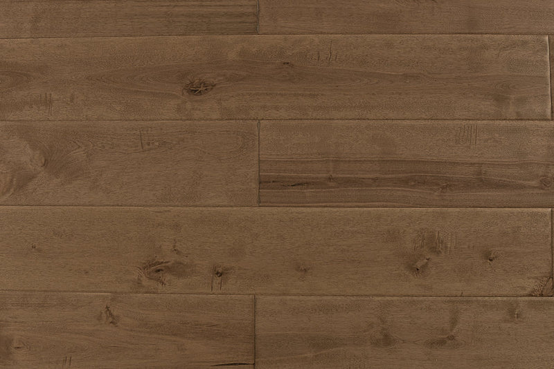 "High-quality Maple Distressed/Handscraped Solid Hardwood Flooring in a Natural Toast finish. Each plank measures 3/4 x 5 inches. SKU: TRPSH-MPNT. Enhance your space with its warm tones and exquisite texture."