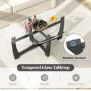 Oval Coffee Table with Tempered Glass Tabletop and Rubber Wood Legs-Black by DirectDeals