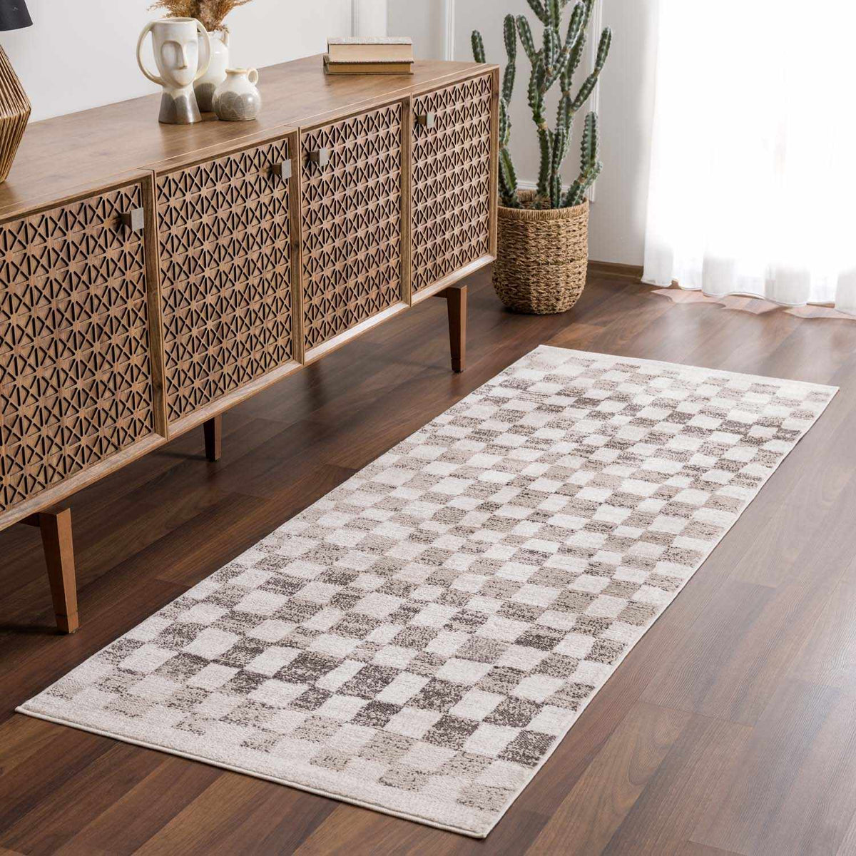Benjy Beige Checkered Area Rug, installed in a room