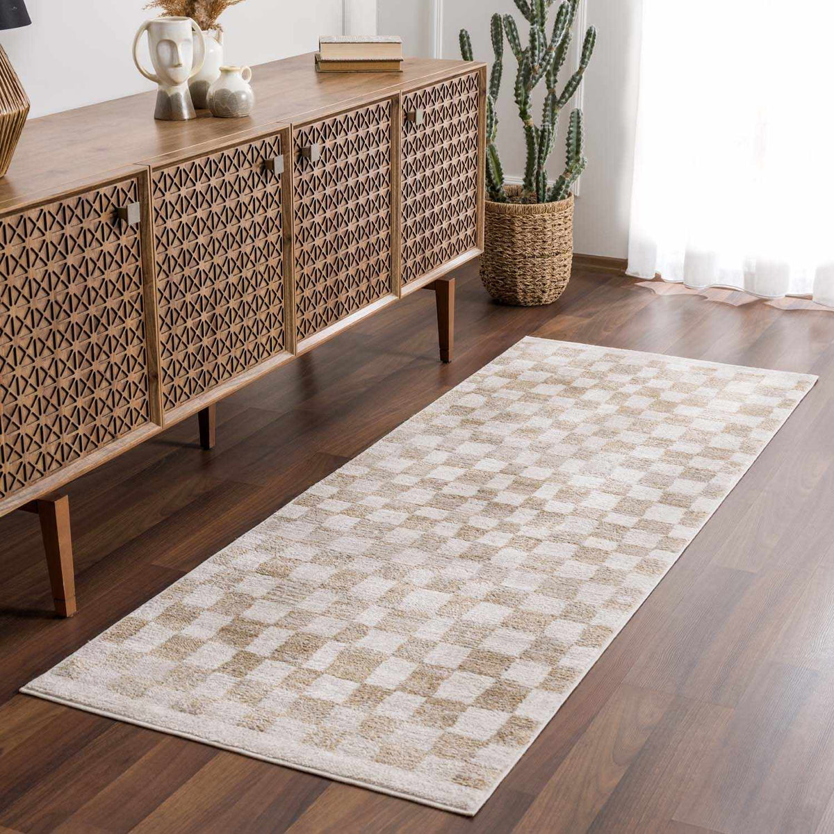 Benjy Cream & Gold Checkered Area Rug, installed in a room