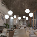 Modern White Globe Glass Pendant Light in Gold, Black, or Silver