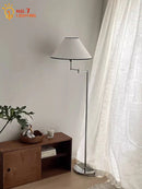 GobekUsa Cream Rocker Arm LED Floor Lamp for Modern Living Spaces