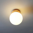 GobekUsa Glass Ball LED Ceiling Lamp on Wooden Pedestal