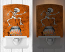 Skeleton jumping from Witches Caldron Halloween Ceramic Night Light Compact, UL-Certified, Ideal for Bedroom, Bathroom, Nursery, Hallway, Kitchen, 6x4x3, Multicolor