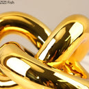 GobekUsa Gold-plated Knot Ornaments: Modern Geometric Resin Desk Decor & Room Craft
