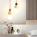 Cream Stone Pendant Light With Wood Accent