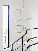 GobekUsa Glass Branching Staircase Chandelier with LED Multi-Color Lampshades.
