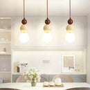 Cream Stone Pendant Light With Wood Accent