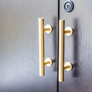 Lew's Round Bar Cabinet Knobs and Handles in Brushed Brass by Forge Hardware Studio