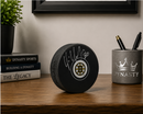 Tim Thomas Boston Bruins Autographed Logo Puck by Dynasty Sports & Framing