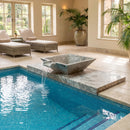 Indoor pool with marble water feature and lounge chairs. Silver Travertine Natural Stone Pool Square Poolwok with Lip