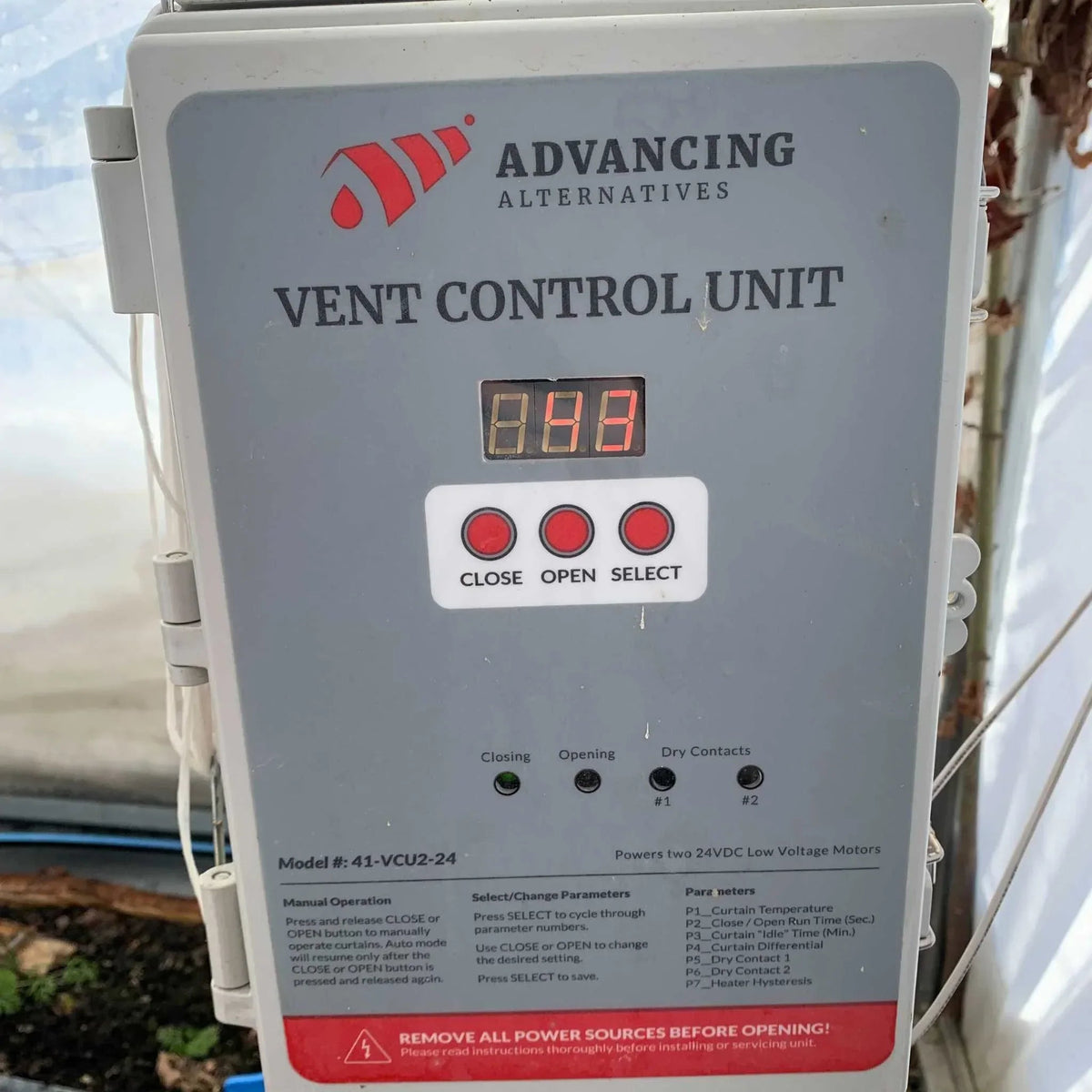 Bootstrap Farmer Automated Roll-Up Sides Motor, installed in a room