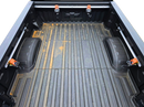 Truck bed tie down system