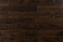 Close-up of Maple Distressed/Handscraped Solid Hardwood Flooring Planks, 3/4 x 5 inches, in a rich Walnut finish, showcasing its natural texture and warmth.