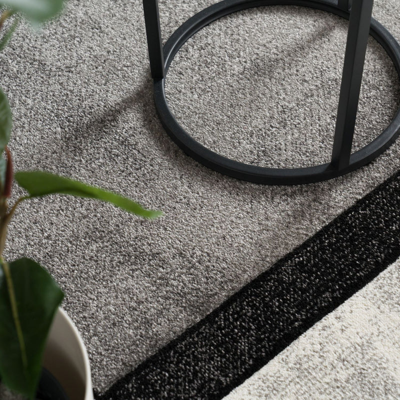 Area Rug Brilliance with Geometric Squares in Black White
