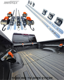 Truck bed tie down system