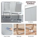 A simple dining table. A dining table with a white marble pattern. 4 PU synthetic leather high backrest cushioned side chairs with C-shaped silver metal legs. DT-SQ-16090-wh