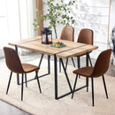 A set of 4 modern medieval style restaurant cushioned side chairs, equipped with soft cushions and black metal legs, suitable for kitchens, lounges, and farmhouses.