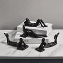 Abstract golden thinker reader man figurine living room decor by Decorbites