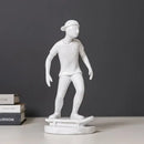Abstract sports player sculpture set grey & white living room decor by Decorbites
