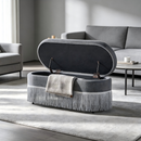 Oval Upholstered Storage Ottoman with Fringe Trim