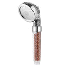 Adjustable shower head with chrome accents and filter beads bathroom by Decorbites