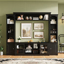 All-In-One TV Stand With Bookcase For TVs Up To 65"