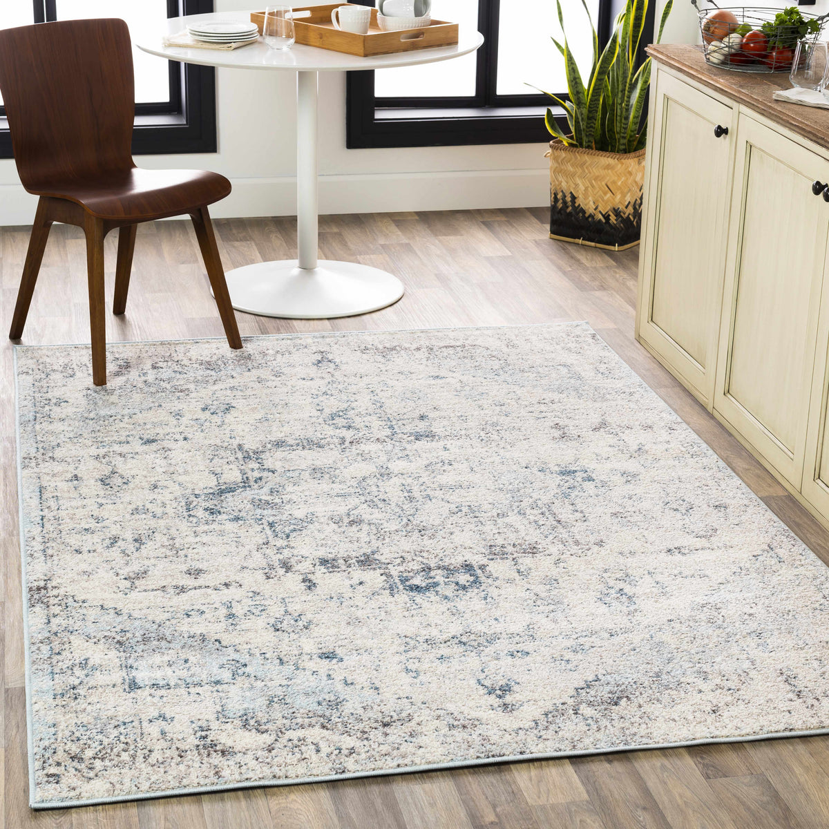 Orrick Area Rug, installed in a room