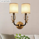 GobekUsa Modern 1/2 Lights Wall Sconce with Fabric Shade - Black/Gold Cylinder Wall Mount Fixture featuring Metal Antler