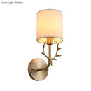 GobekUsa Modern 1/2 Lights Wall Sconce with Fabric Shade - Black/Gold Cylinder Wall Mount Fixture featuring Metal Antler