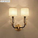 GobekUsa Modern 1/2 Lights Wall Sconce with Fabric Shade - Black/Gold Cylinder Wall Mount Fixture featuring Metal Antler