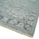 Distressed finished 8x10 Gray and Silver Low Pile wool Rug