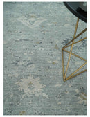 Distressed finished 8x10 Gray and Silver Low Pile wool Rug